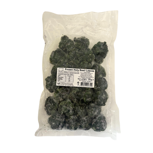 Bag of frozen holy basil leaves with a label on a white background
