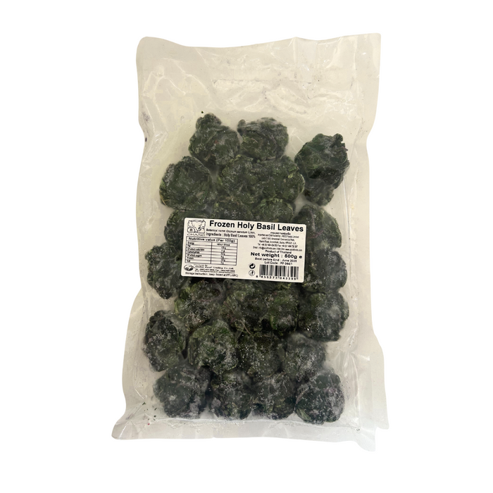 Bag of frozen holy basil leaves with a label on a white background